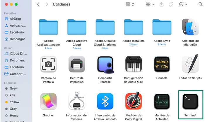 Mac Utilities folder showing Terminal app icon.