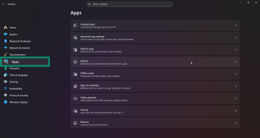Windows 11 Settings showing the Apps menu highlighted on the left side.